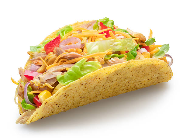 istock Mexican chicken meat taco, corn-based tortilla with chicken meat and diced fresh vegetables filling isolated on white. File contains clipping path. 2226940117