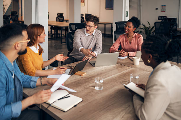 istock Team Engaged in a Discussion During a Collaborative Business Meeting in Modern Office 2226940568