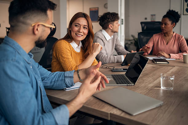 istock Collaborative Meeting of Diverse Professionals in a Modern Office Space 2226940573