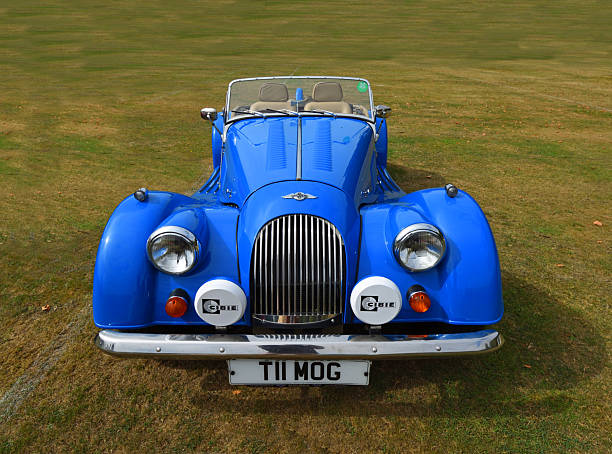 Upper Dean, Bedfordshire, England - September 07, 2024: \nClassic  blue 2013 Morgan 3. 7 Roadster  parked on grass