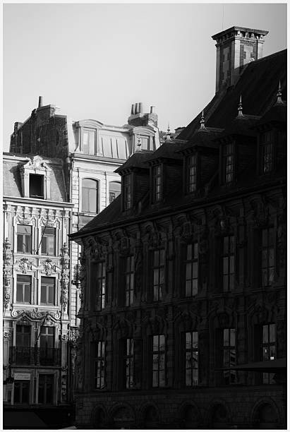 istock Old European building facades in dramatic light – black and white architecture shot 2226943814