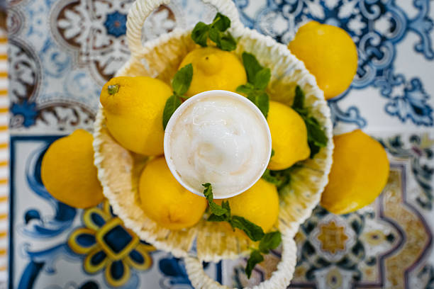 Ice Cream In A Bowl Of Lemons On The Table In An Ice Cream Shop