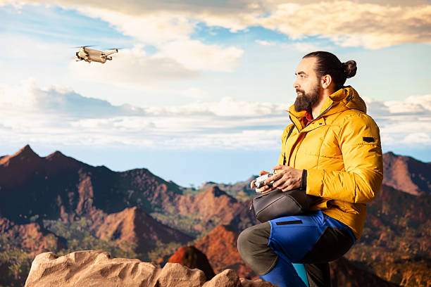 istock Content creator enjoying the fresh air and filming with his drone 2226948408