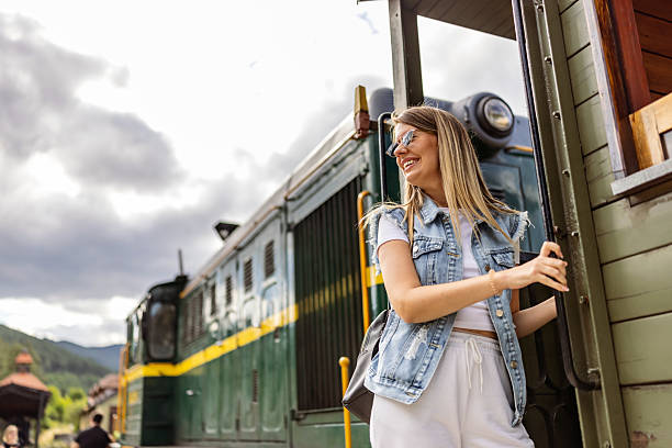 istock Woman Enjoying Train Ride Experience on a Beautiful Day 2226950621