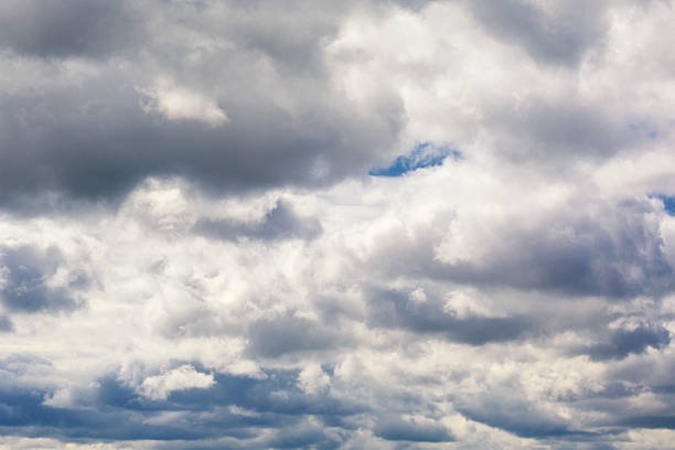 istock Light clouds curl and swirl, covering the blue sky, close-up, light delicate white clouds in the sky, cloudy background. 2226953000