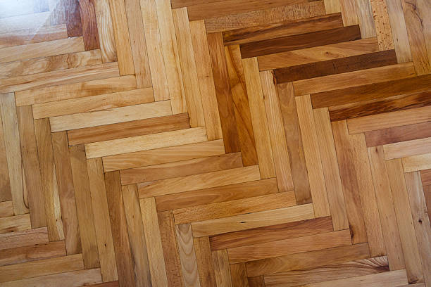 istock Varnished Parquet Floor In An Empty Apartment 2226953084