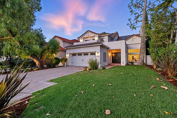 istock Storybook Traditional with Lush Backyard, Pool, Spa, and String Lights 2226954808