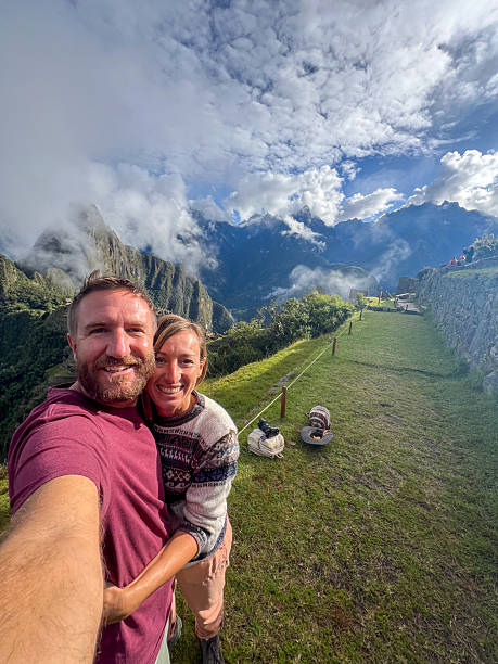 istock Happy Couple Taking Selfie at Mountain Viewpoint 2226956539