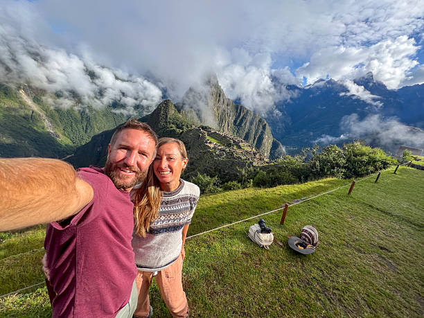 istock Happy Couple Taking Selfie at Mountain Viewpoint 2226956540