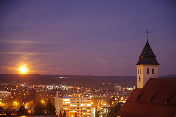 istock City at night with a large clock tower in the background 2226958100