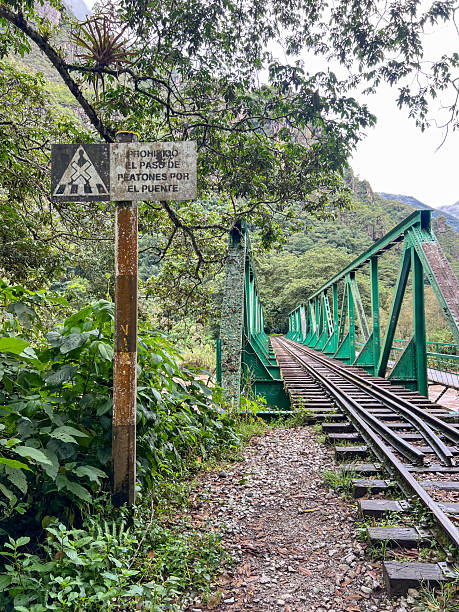 istock Rusty Warning Sign Near Green Railway Bridge 2226959519