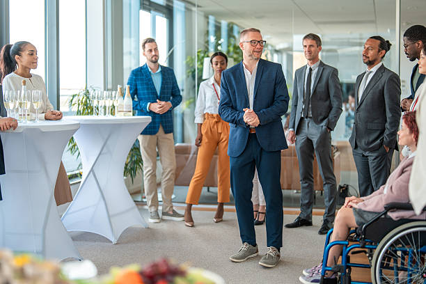 istock Diverse Business Team Celebrating with Champagne in Office Setting 2226961117