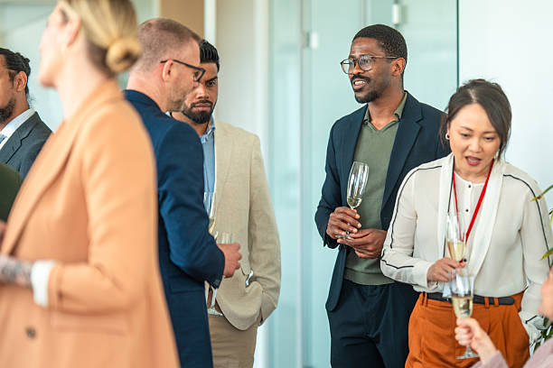 istock Diverse Group of Professionals Celebrating with Champagne in Modern Office 2226961149