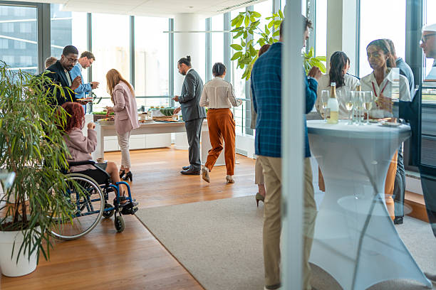 istock Diverse Group of Professionals Engaging at Office Buffet Meeting 2226961195