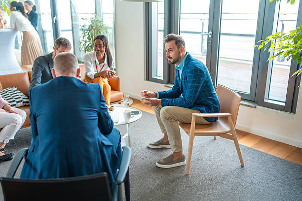 istock Business Professionals in Discussion in a Bright Office Environment 2226961204