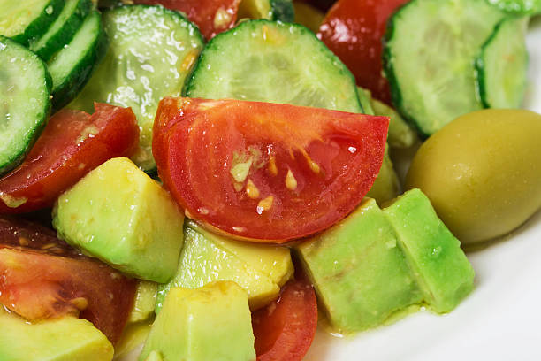 istock Fresh avocado salad with olives. 2226961368