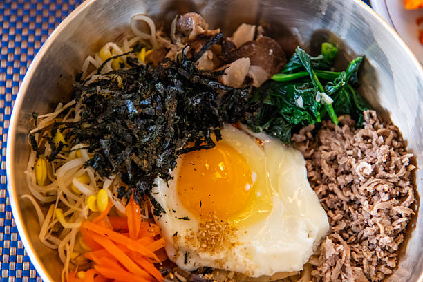 istock bibimbap in the brass bowl 2226962520