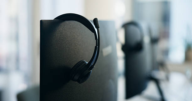 istock Empty, headset and computer in office at call center for contact us, customer service and consulting. Equipment, desktop and monitor for virtual assistance, tech support and crm at insurance agency 2226965175