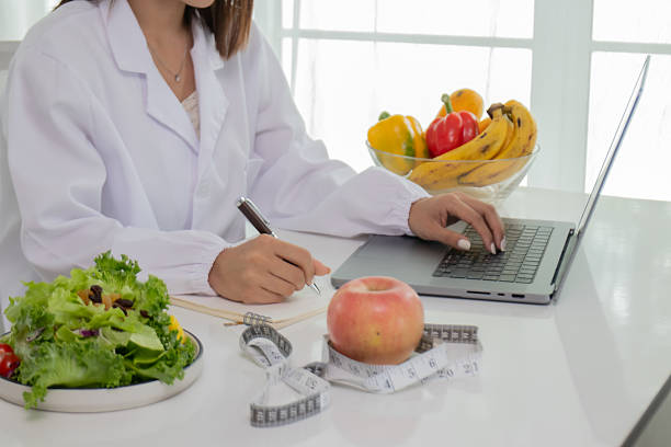 istock A female lab technician examines broccoli for scientific research in microbiology, biotechnology, and nutrition to advance health. 2226965543