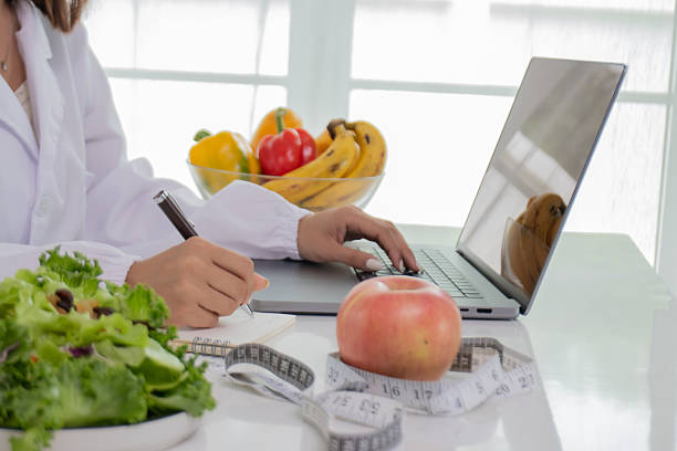 istock A female lab technician examines broccoli for scientific research in microbiology, biotechnology, and nutrition to advance health. 2226965564