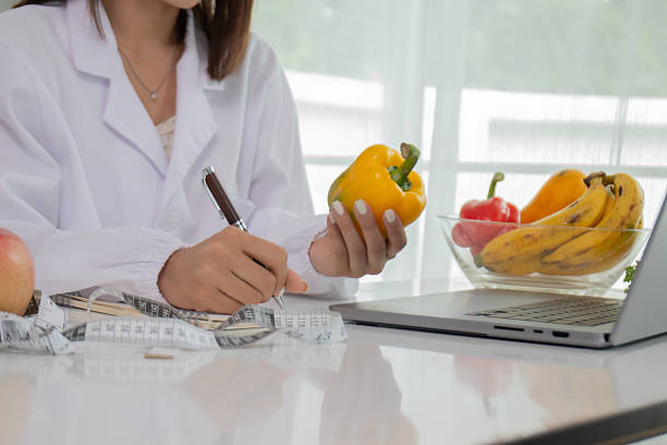 istock A female lab technician examines broccoli for scientific research in microbiology, biotechnology, and nutrition to advance health. 2226965631