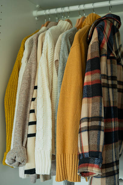 istock Warm autumn clothes knitted in the closet. Home organization. 2226965700