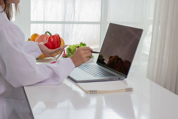 istock A female lab technician examines broccoli for scientific research in microbiology, biotechnology, and nutrition to advance health. 2226965861