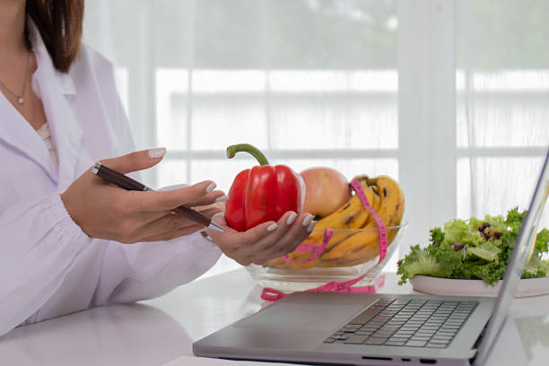 istock A female lab technician examines broccoli for scientific research in microbiology, biotechnology, and nutrition to advance health. 2226966007