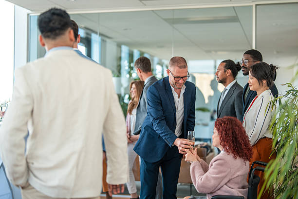 istock Business Executives Toasting with Champagne in a Contemporary Office Setting 2226968182