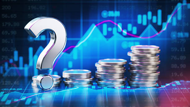 istock Metallic Question Mark and Coins Over Financial Chart Background 2226971404