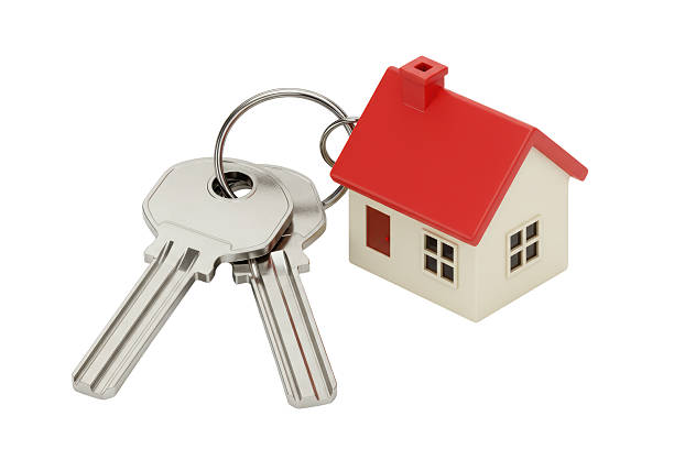 istock Isolated House Keys and Red Roofed House Keychain 2226971511