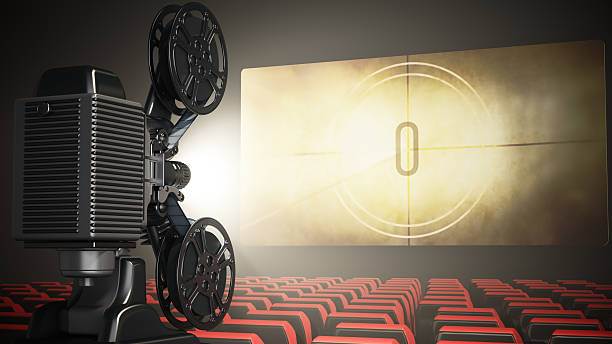 istock Classic film projector set against empty cinema rows in dim light creating a nostalgic atmosphere. Movie countdown in the film screen 2226976440
