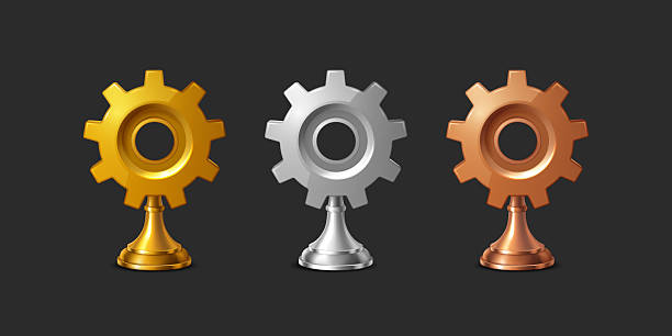 istock Gold silver and bronze gear trophies for technology award and success 2226976525