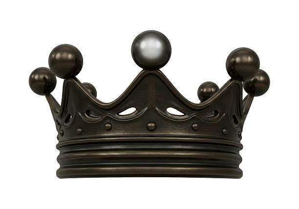 Decorative gold crown on a red plinth. Red background with copy space