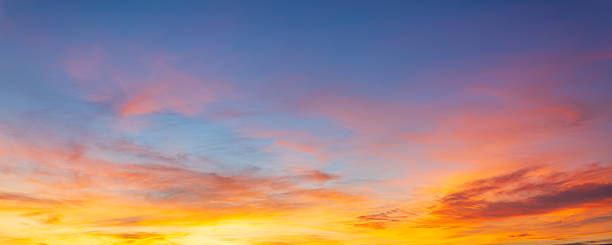 istock Colorful clouds and sky backdrop,Sunset Sky Background in the Evening with Dramatic Dusk Clouds and Colorful Pink, Orange Sunlight on Blue Twilight sky, Beautiful Summer Sunrise Horizon sky Backdrop. 2226979391