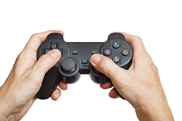 istock Closeup humans hands holding Gamepad isolated on white 2226981708