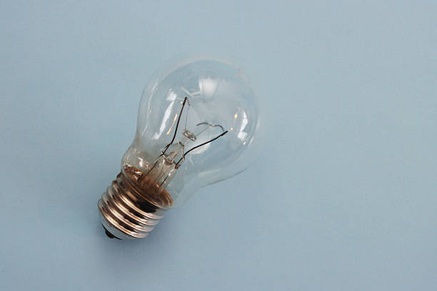 istock Old transparent incandescent lamp, top view. 2226981973