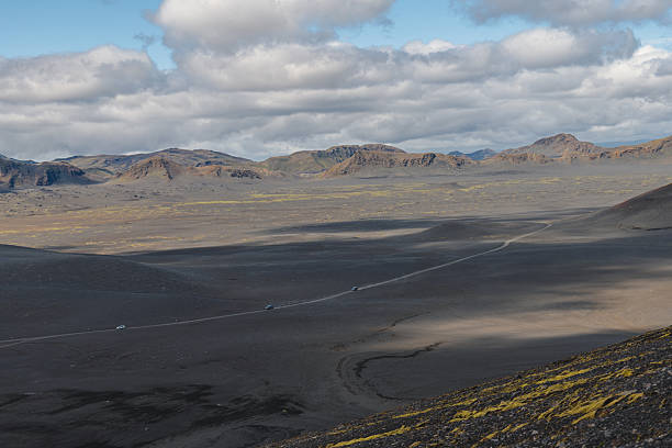 istock Winding Road Through Volcanic Highlands in Iceland's Rugged Terrain 2226986023
