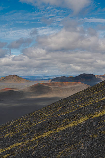 Volcanic Terrain with Moss and Reddish Brown Hills in Iceland