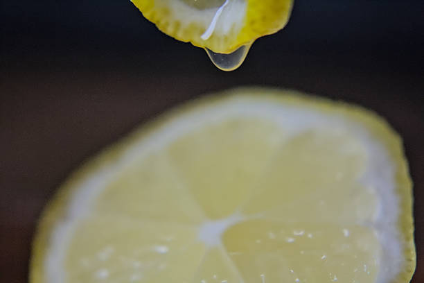 Lemon juice drop caught in a moment macro view