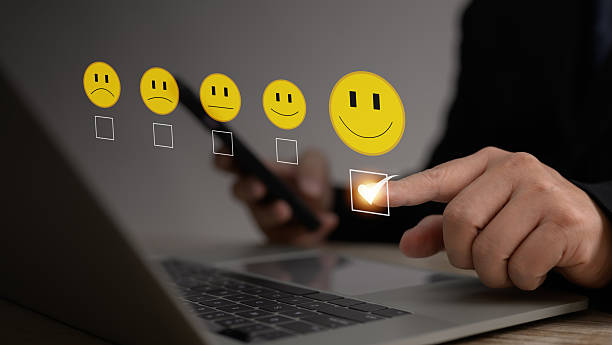 istock User interacting with digital customer satisfaction gauge and five-star rating system, highlighting positive service feedback, performance evaluation, quality assurance in online business platforms. 2226988106