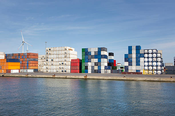 istock Stacked containers and ships - port of Antwerp 2226992989