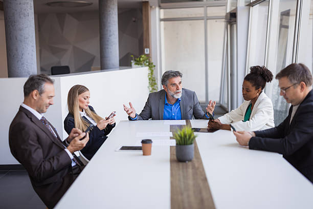 istock Business team ignoring their manager during a meeting 2226995299