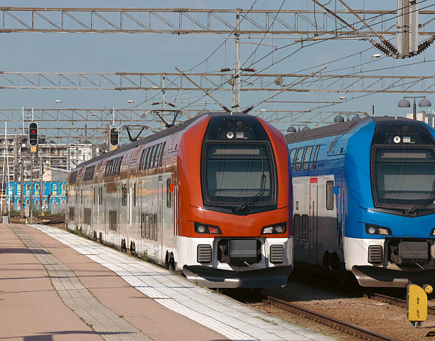 istock Modern trains at a train station 2227001218