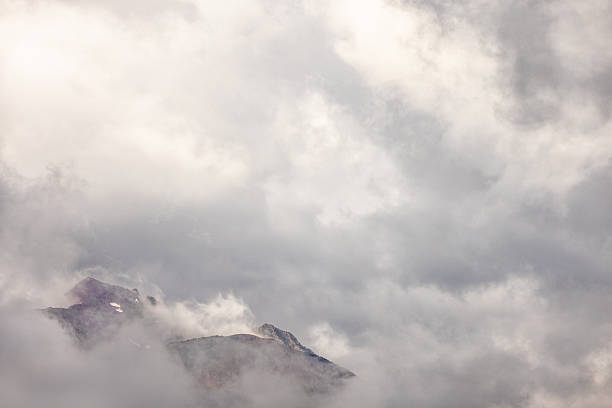 Mountain Range Covered by Large Rain Clouds, Copy Space, Marketing, Backgrounds