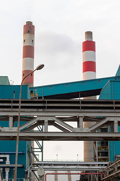 istock Industrial landscape showcasing power plant infrastructure with distinctive chimneys 2227009573