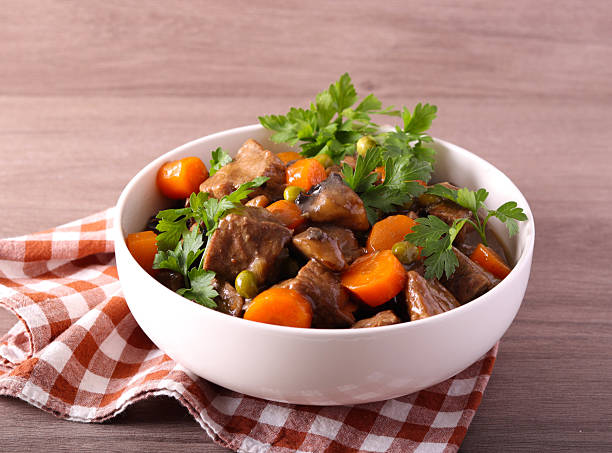 istock stew with mushrooms, carrot and peas 2227010735