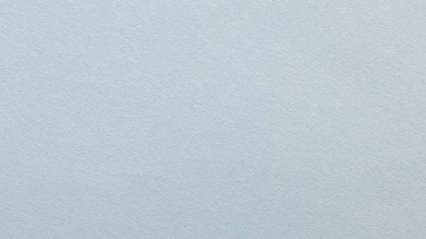 istock Minimal Gray Surface with Soft Grainy Paper Texture Close-Up 2227011895