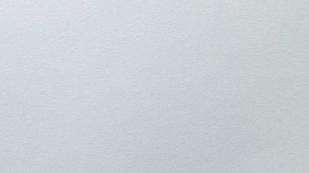 istock Minimal Gray Surface with Soft Grainy Paper Texture Close-Up 2227011898