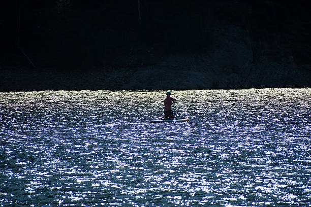 Summer Sunset Sea Paddle Boarding